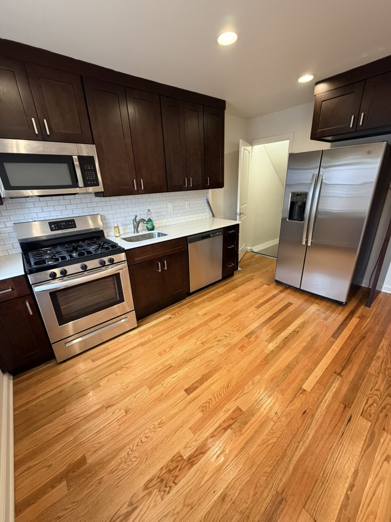 Empty kitchen cleaned for a home handoff